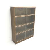 Minty oak four sectional library bookcase, glazed sliding doors, plinth base, W90cm, H127cm, D24cm