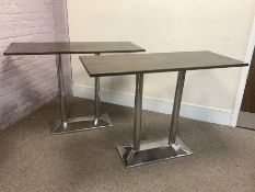 Two tall rectangular top caf� bistro tables on polished metal bases, 150cm x 60cm, H105cm
