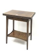 Edwardian figured walnut occasional table, fold over moulded rectangular top with satinwood banding,