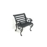 Cast iron framed garden chair with moulded rams head, timber slats