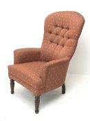 Late 20th century beech framed armchair upholstered in buttoned pale red patterned fabric, turned su