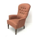 Late 20th century beech framed armchair upholstered in buttoned pale red patterned fabric, turned su