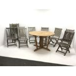 Circular teak drop leaf garden table with gate leg base (D122cm, H76cm), and ten teak folding garden