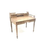 Eastern hardwood clerks desk, raised back with pierced gallery, four small drawers above sloping fro