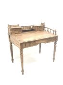 Eastern hardwood clerks desk, raised back with pierced gallery, four small drawers above sloping fro