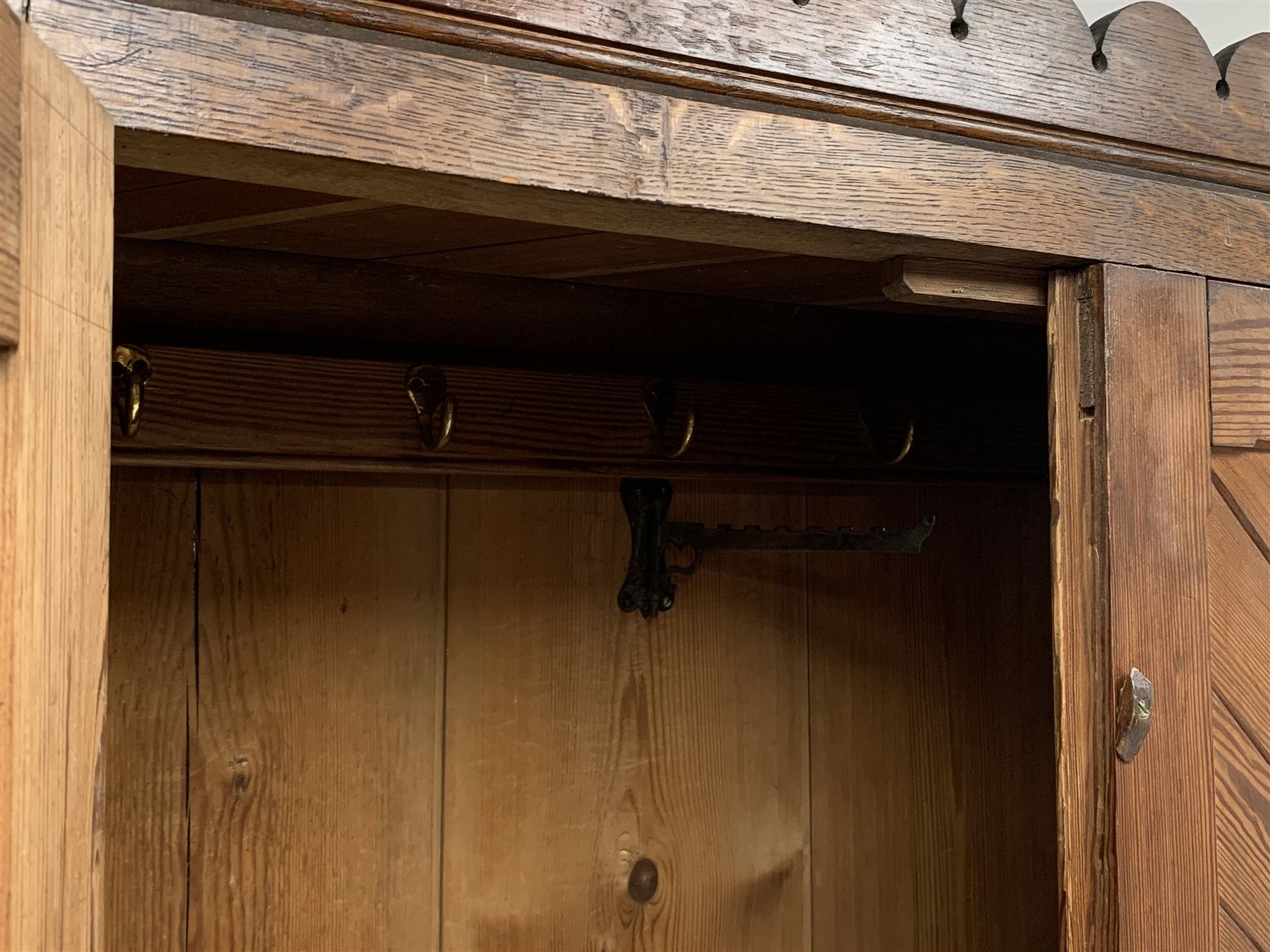 Late Victorian Aesthetic movement pitch pine and oak hall wardrobe, two paneled doors enclosing hook - Image 3 of 3