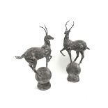 Pair cast metal garden stags on spherical mounts, figures/gate post finials,