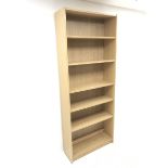 Light oak open case, five shelves, plinth base