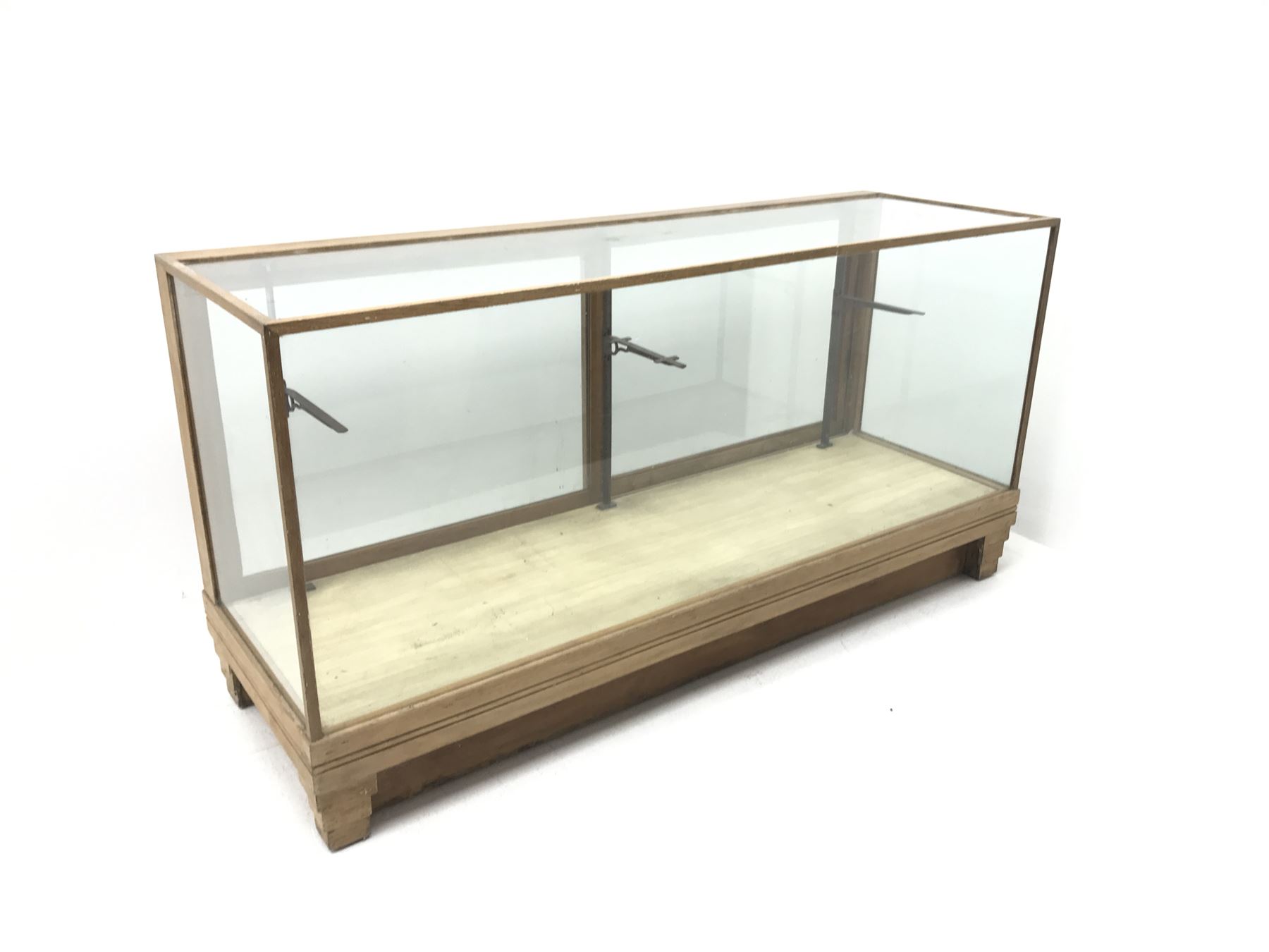 Mid century oak framed glazed display counter, two sliding doors, W182cm, H91cm, D61cm