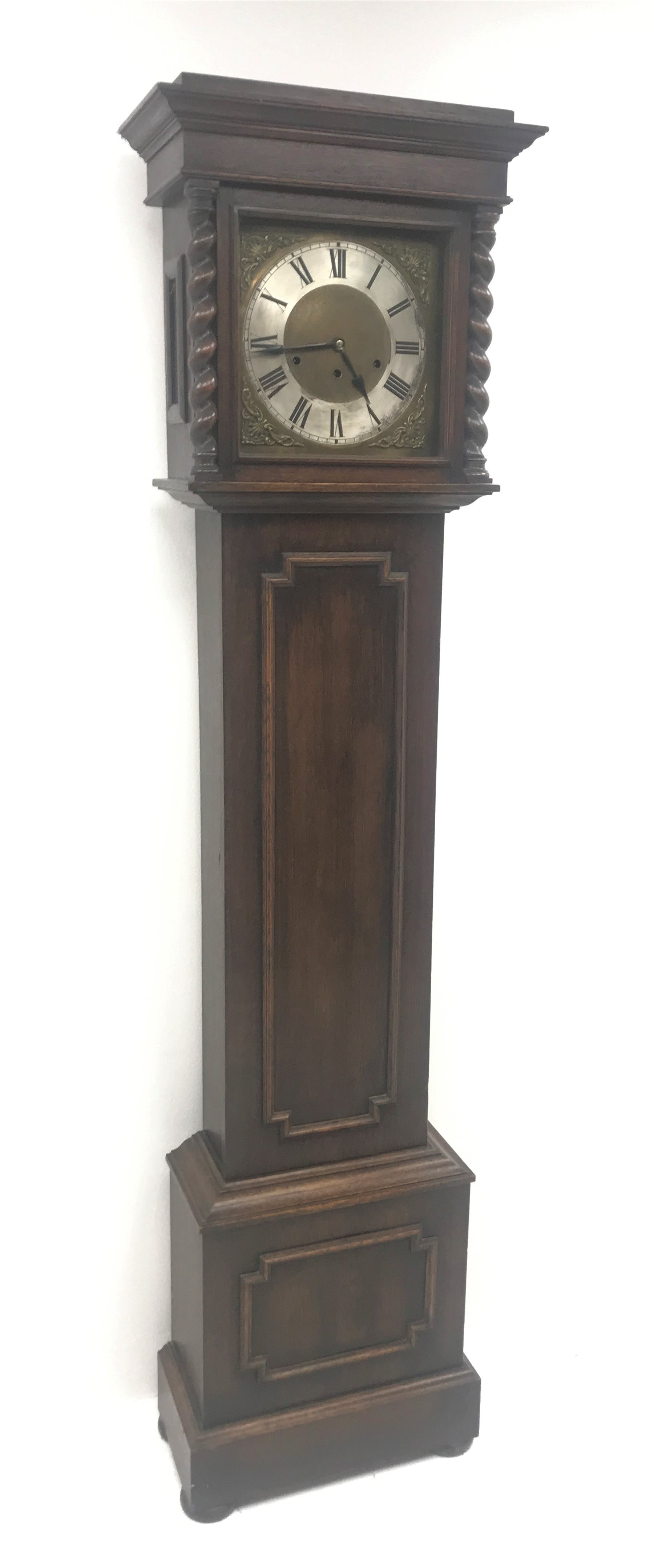 Early 20th century oak longcase clock, brass dial with silvered Roman chapter ring, triple train dri