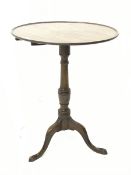 Georgian mahogany tripod table, circular dished tilt top with moulded edge, tilting on elm block, tu