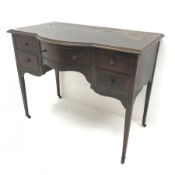 Edwardian central bow fronted mahogany writing desk, leather inset top, one long and four short grad