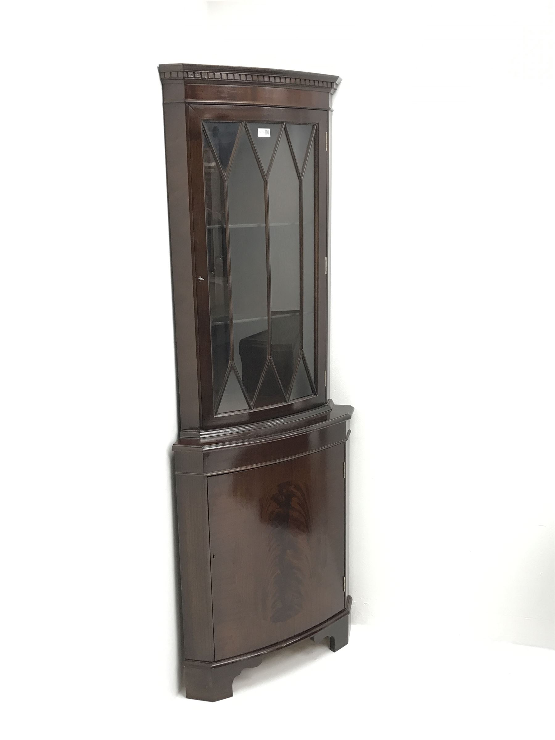 Mid century mahogany corner display cabinet, single door enclosing shelves above single cupboard, W6