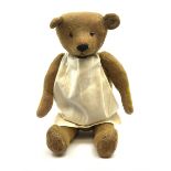 Early 20th century English teddy bear c1920 with wood wool filled body