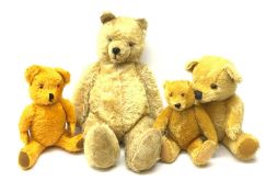 Four 1950s English/European teddy bears including an orange plush clockwork musical bear with revolv