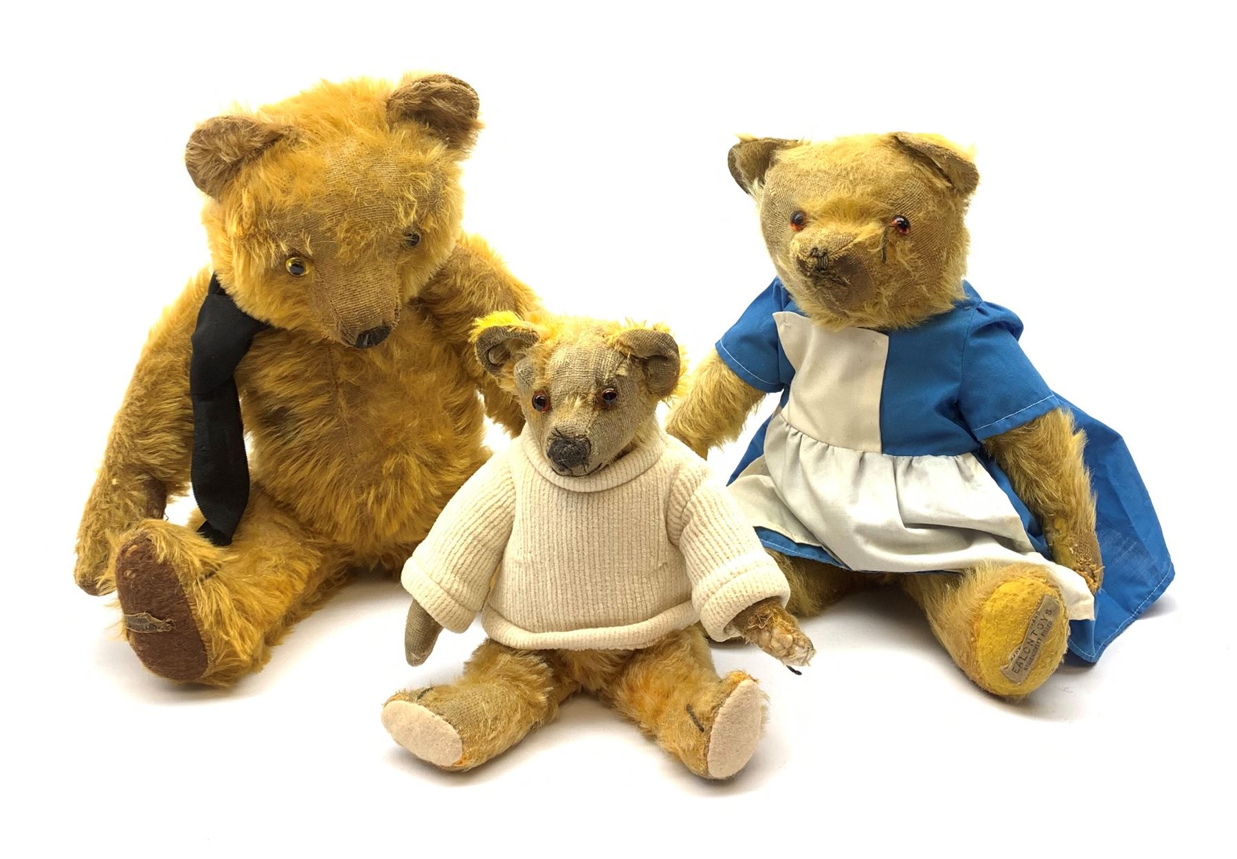 Three English teddy bears comprising 1930s Merrythought with kapok filled bright golden mohair body