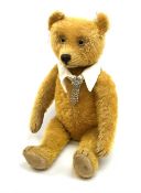 Schuco 'yes-no' teddy bear c1925 with wood wool filled short golden mohair body