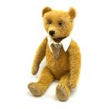 Schuco 'yes-no' teddy bear c1925 with wood wool filled short golden mohair body