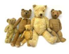 Five 1930s English teddy bears including large Chiltern with swivel jointed head