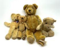 Three 1950s teddy bears including Chiltern dog type looking baby bear with tail