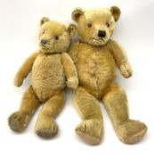 Two large graduated Chiltern teddy bears 1930s-50s each with swivel jointed head