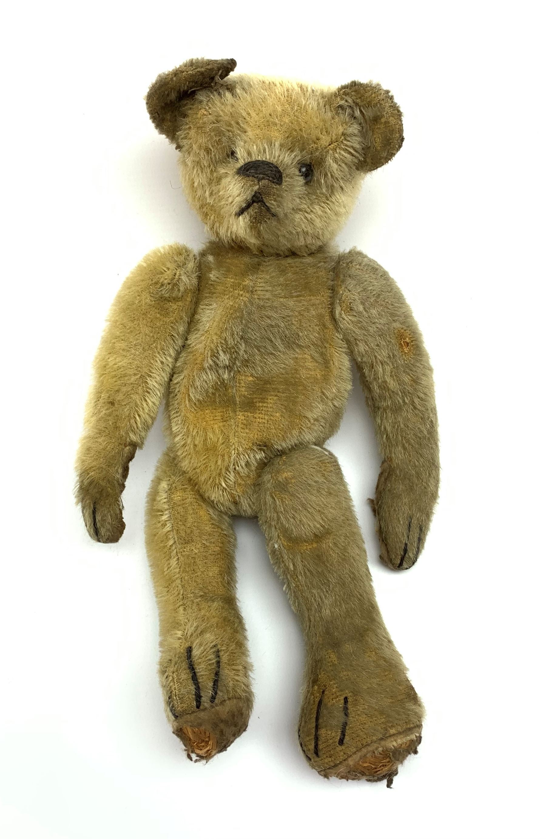 Early 20th century American mohair teddy bear c1920 with wood wool filled body humped back body with