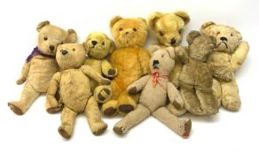 Eight English teddy bears 1950s-60s including Chiltern bear with swivel jointed head