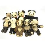 Seven English panda bears c1930s-50s including two Pedigree with plastic dog noses H29cm; Farnell Al