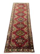 Persian red ground rug