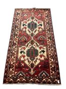 Persian red ground rug