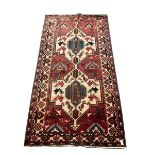 Persian red ground rug