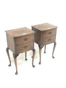 Pair 20th century cross banded walnut lamp chests