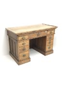 Early 20th century medium oak twin pedestal desk