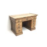 Early 20th century medium oak twin pedestal desk