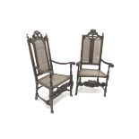 Two mahogany framed Carolean style armchairs