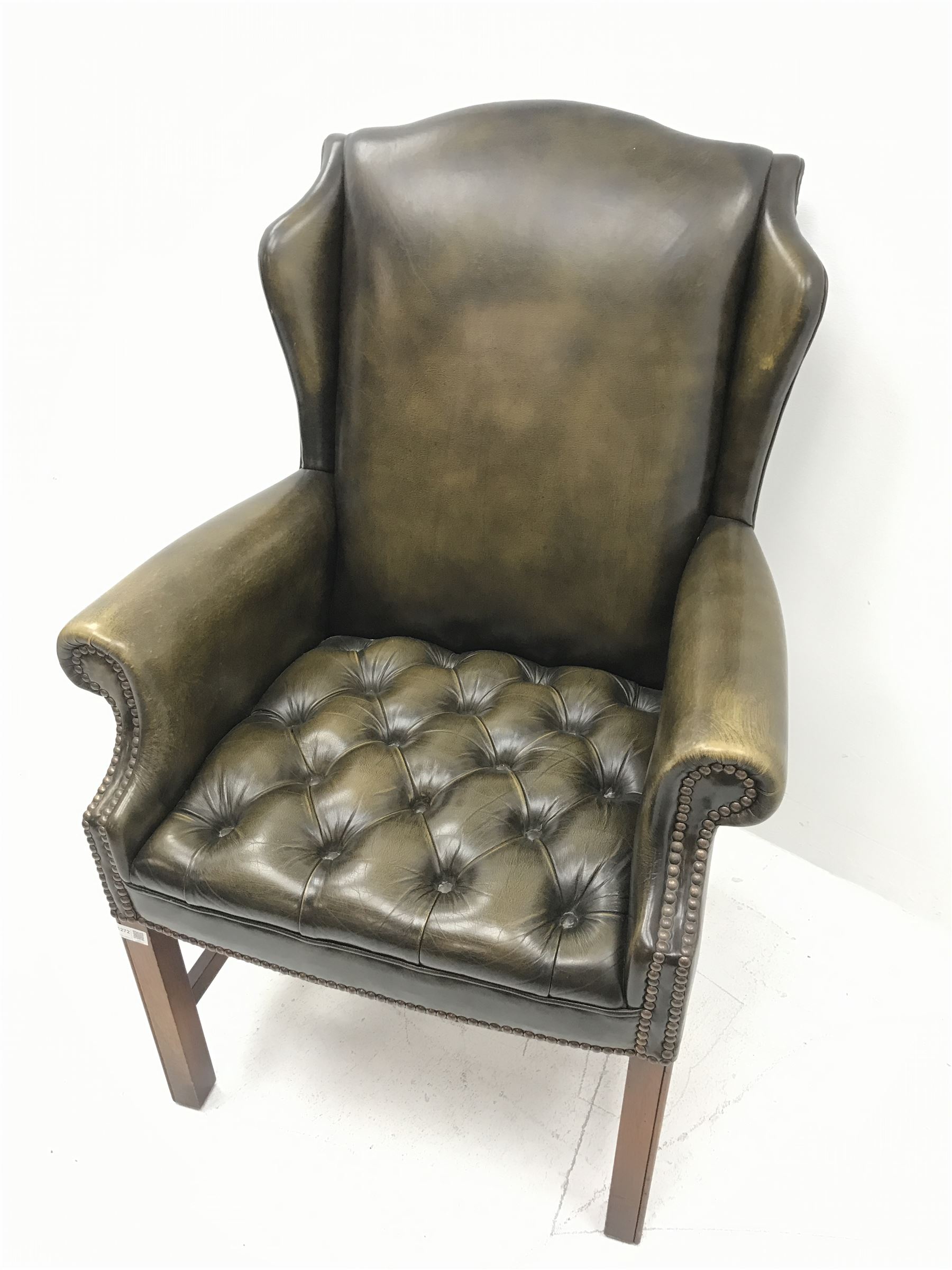 Georgian style wing back armchair upholstered in deep buttoned and studded green leather - Image 3 of 4