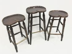 Set three bog oak saddle seat bar stools