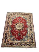 Large Persian red ground rug