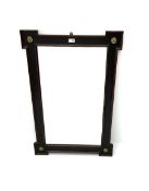 Ebonised moulded framed mirror