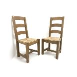 Pair oak ladder back chairs with rush seats