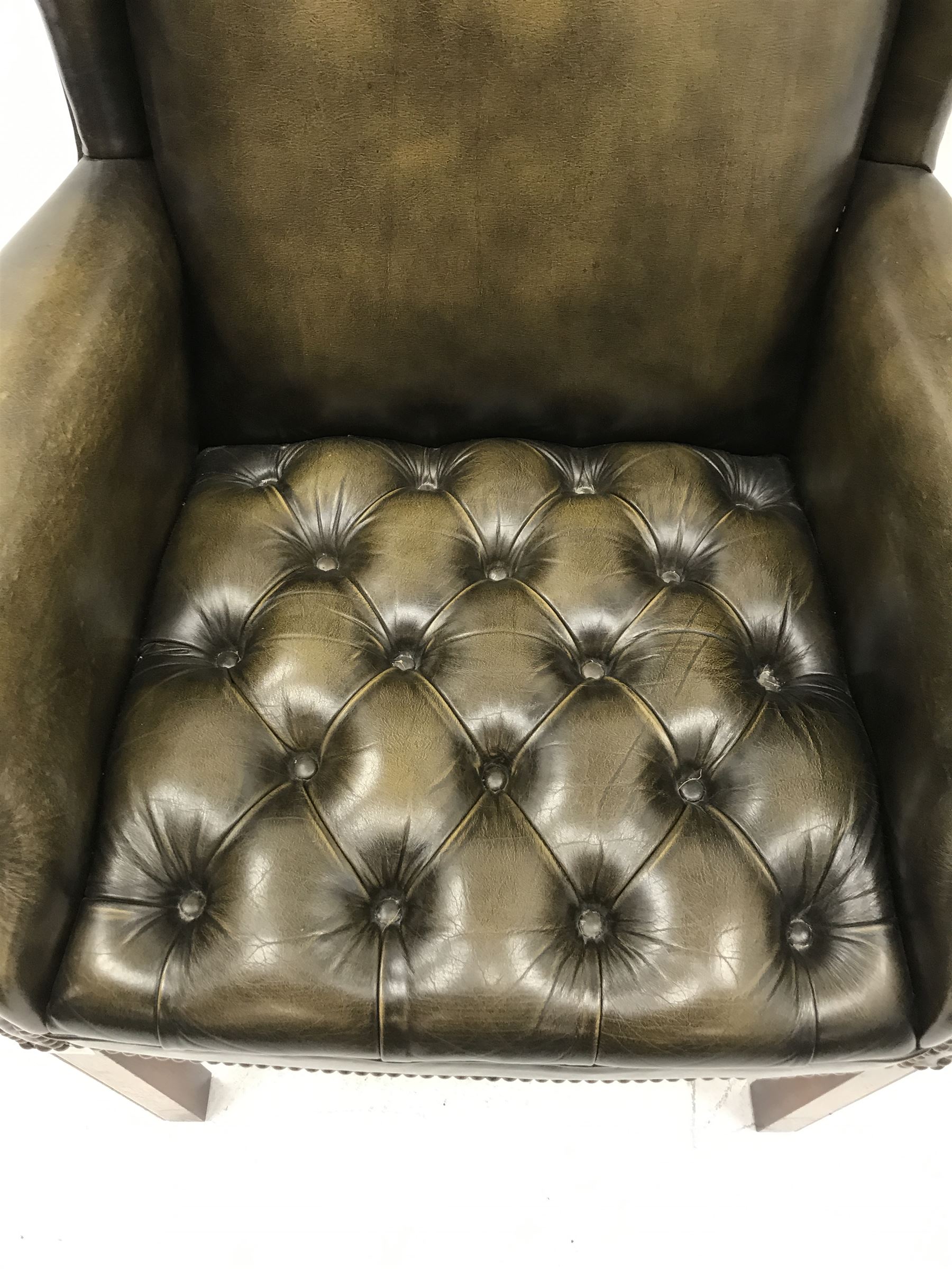 Georgian style wing back armchair upholstered in deep buttoned and studded green leather - Image 4 of 4