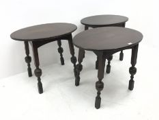 Three oval bog oak bar tables