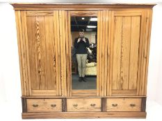 Late Victorian large pitch pine triple wardrobe