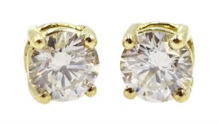 Pair of 18ct gold diamond stud earrings