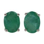 Pair of silver oval emerald stud earrings