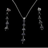 9ct white gold black onyx and cubic zirconia pendant necklace and pair of matching earrings