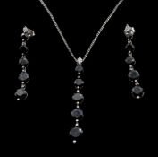 9ct white gold black onyx and cubic zirconia pendant necklace and pair of matching earrings