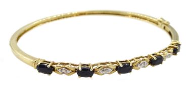 9ct gold diamond and oval sapphire hinged bangle