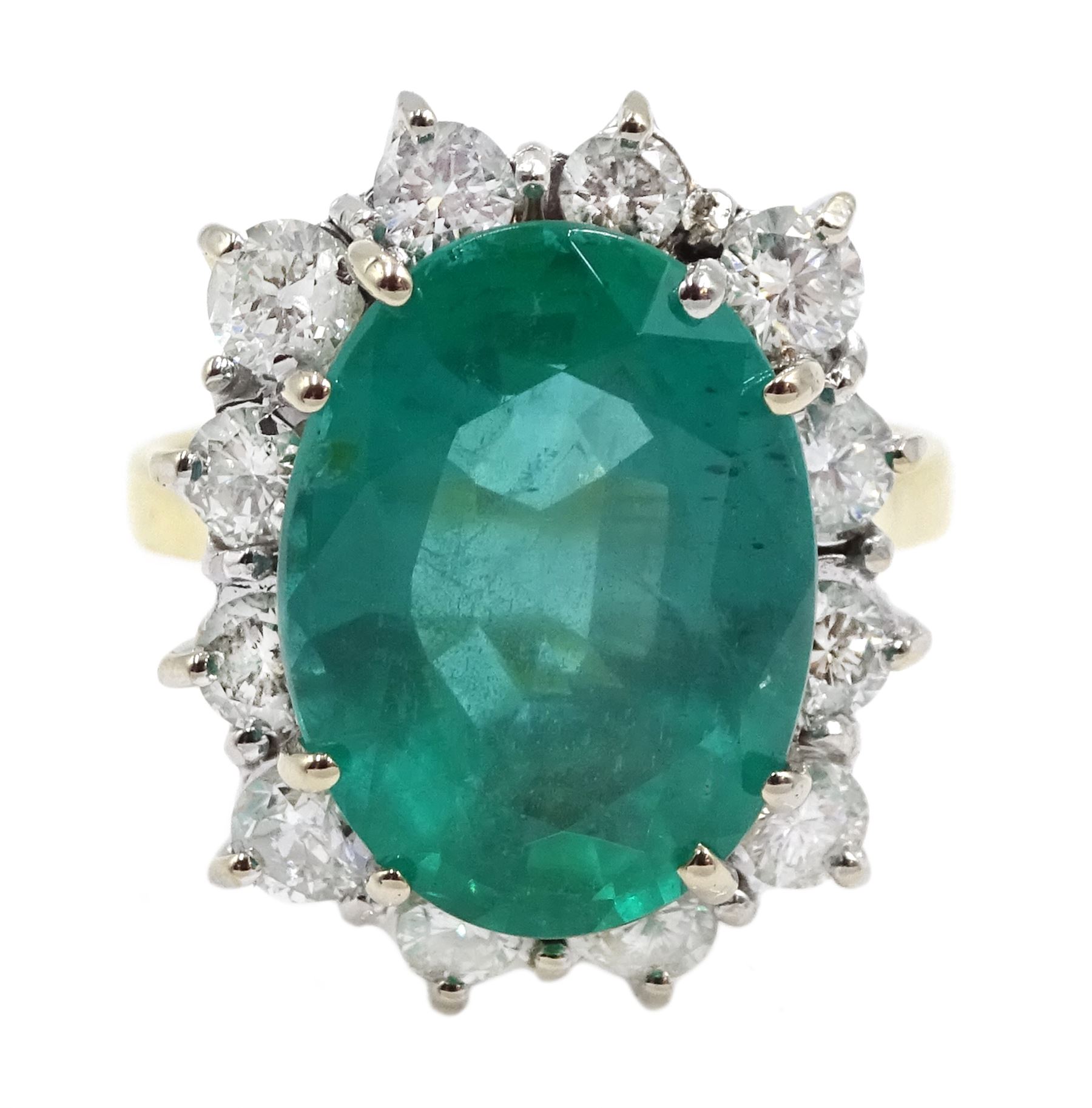 18ct gold oval Zambian emerald and round brilliant cut diamond cluster ring