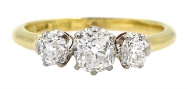 Gold old cut dimaond three stone ring